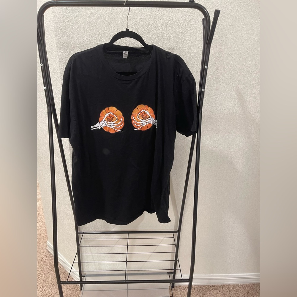 Black T-Shirt with Skeleton hands and Orange Pumpkin Design